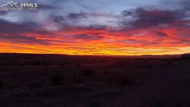 a view of an ocean and mountain