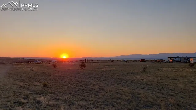 a view of an outdoor space and mountain view in back