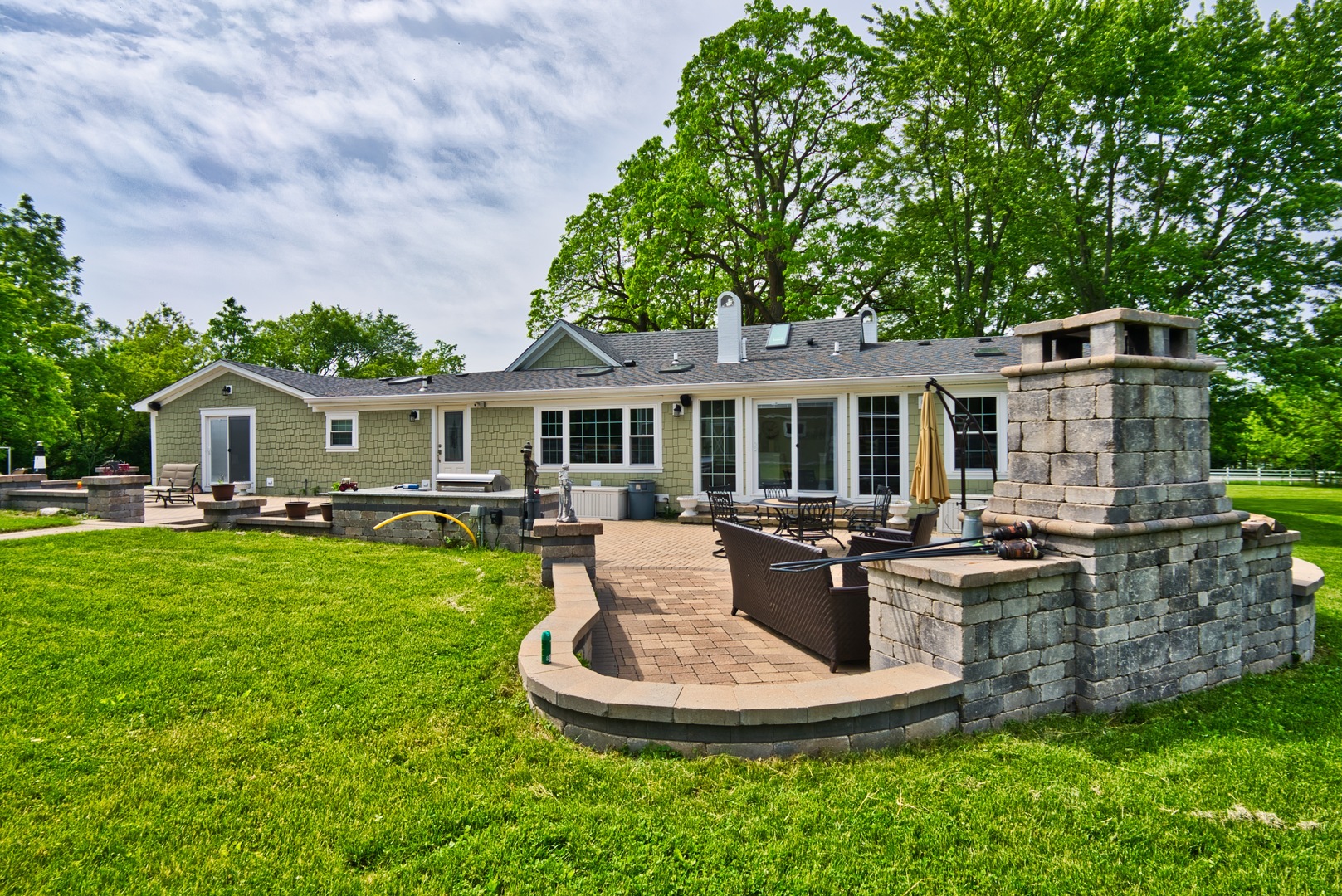 33W878 Army Trail Road Wayne, IL 60184 - Photo 12 of 36 a front view of house with a garden