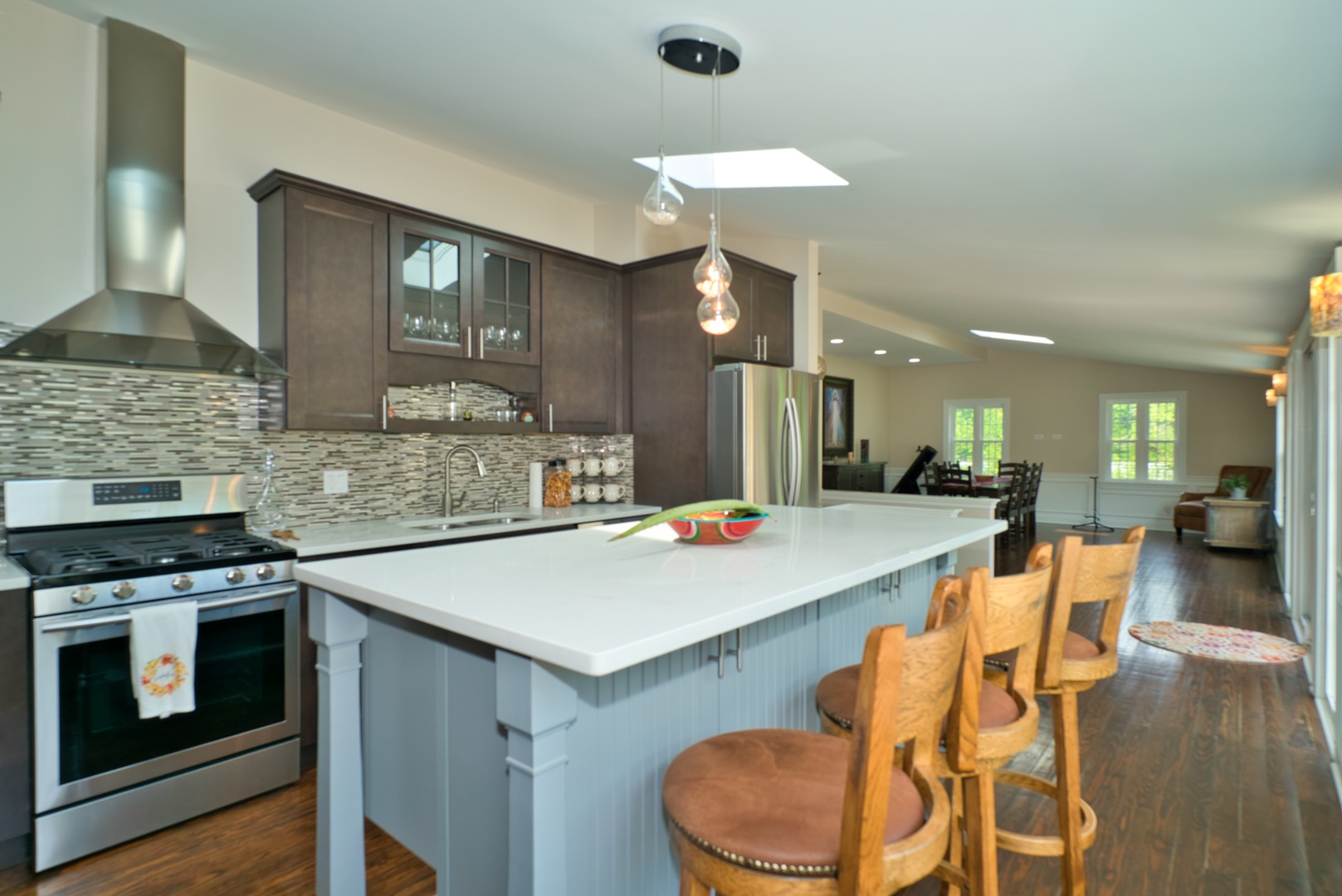 33W878 Army Trail Road Wayne, IL 60184 - Photo 22 of 36 a large kitchen with a table and chairs