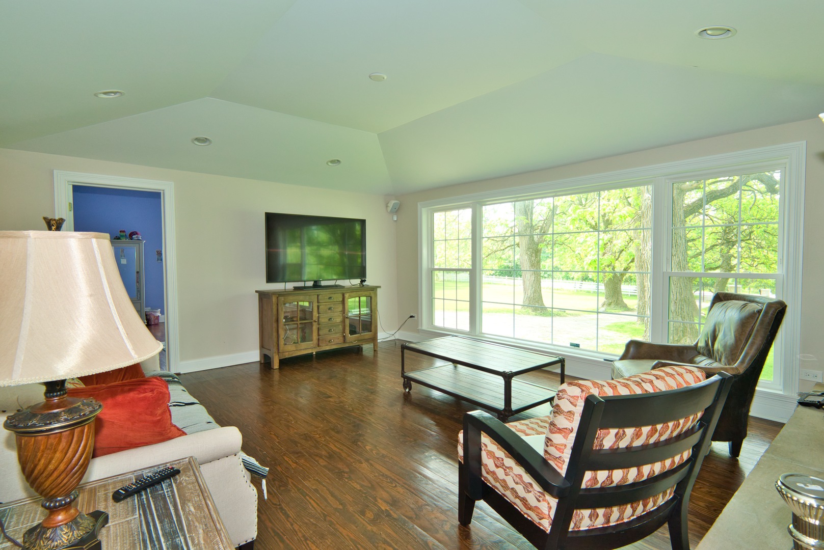 33W878 Army Trail Road Wayne, IL 60184 - Photo 28 of 36 a living room with furniture and a large window