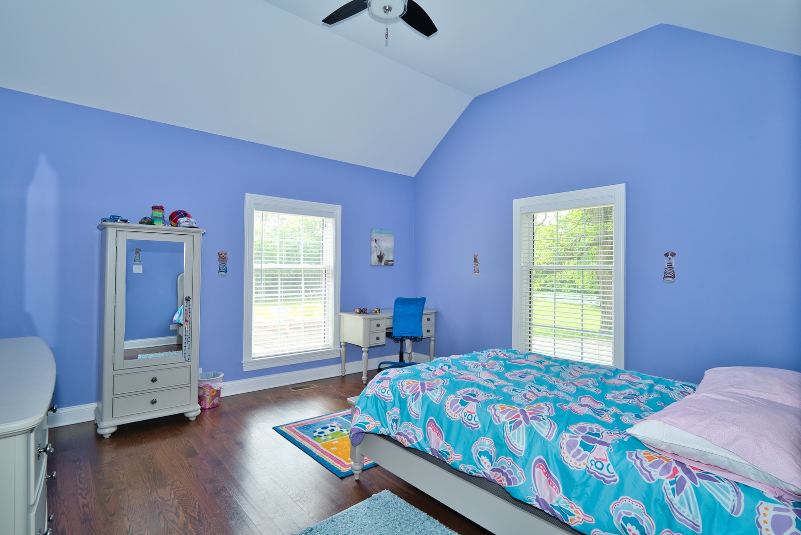 33W878 Army Trail Road Wayne, IL 60184 - Photo 34 of 36 a bedroom with a bed and a chandelier