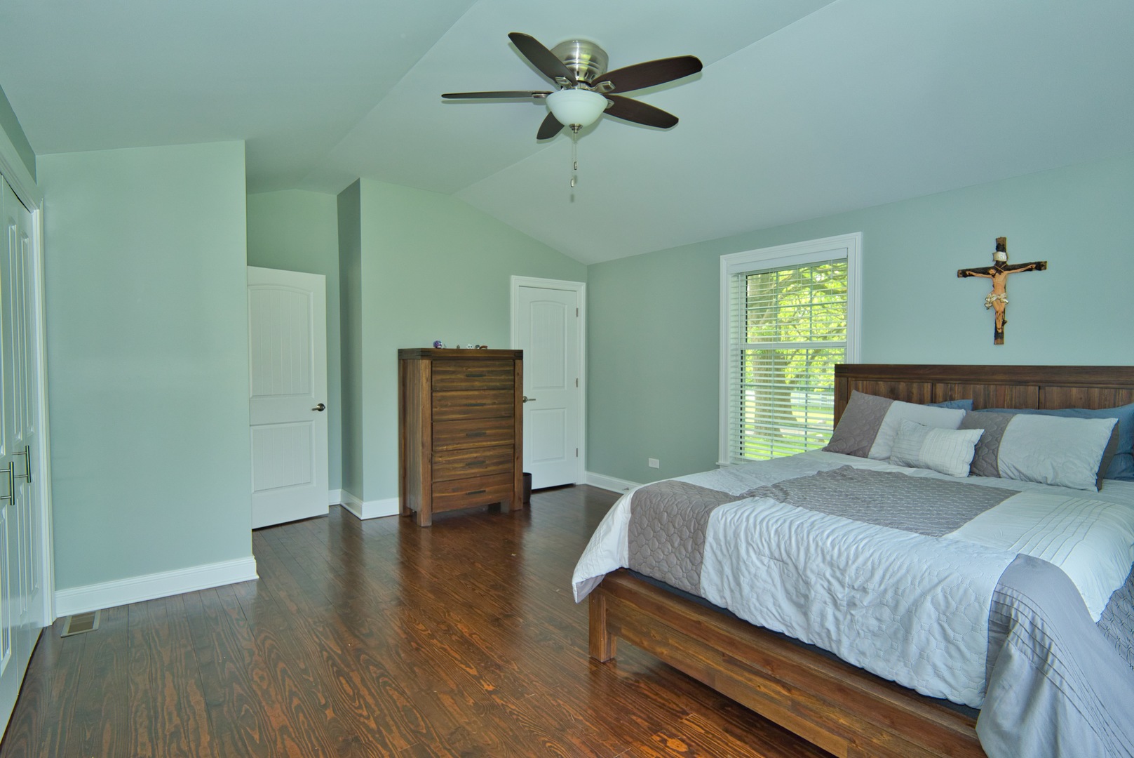 33W878 Army Trail Road Wayne, IL 60184 - Photo 36 of 36 a bedroom with a bed and a chandelier