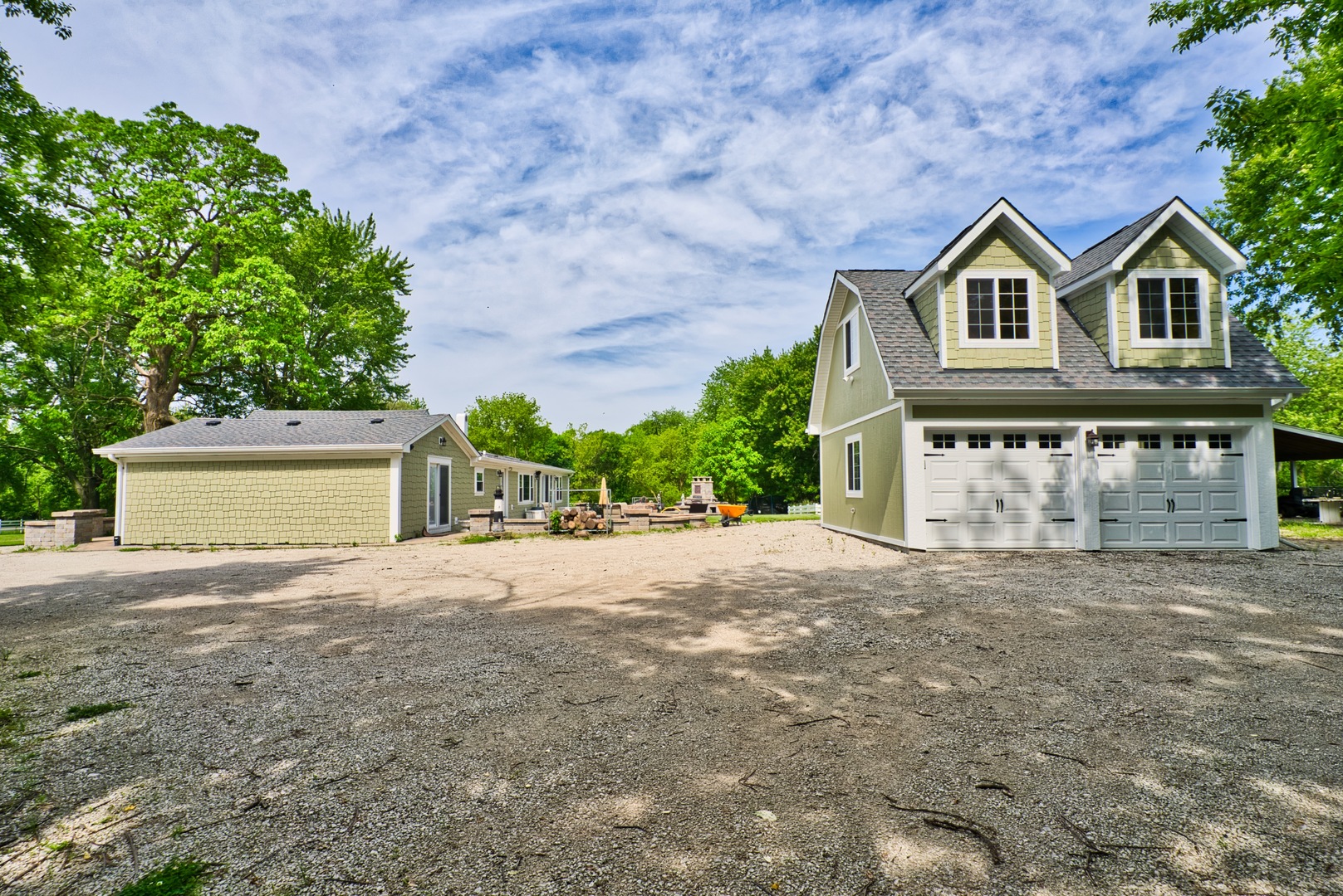 33W878 Army Trail Road Wayne, IL 60184 - Photo 7 of 36 a view of a house with a yard and garage