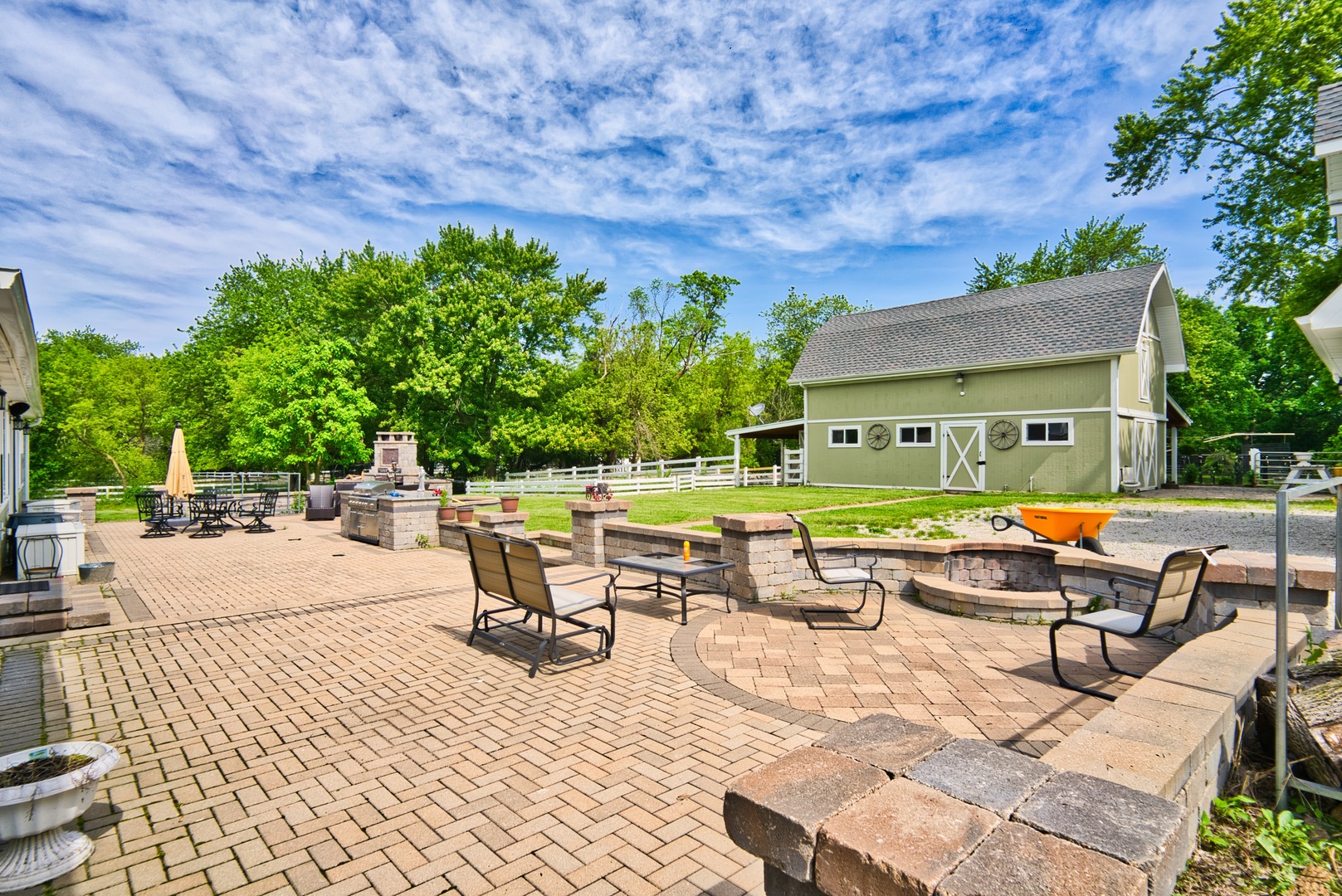 33W878 Army Trail Road Wayne, IL 60184 - Photo 9 of 36 a view of backyard with outdoor seating
