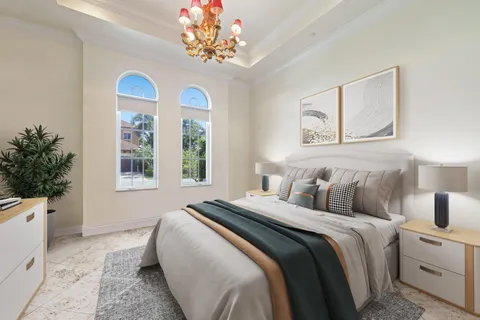 an aerial view of a house with a lake view