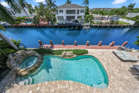 a large bathroom with a large tub and sink
