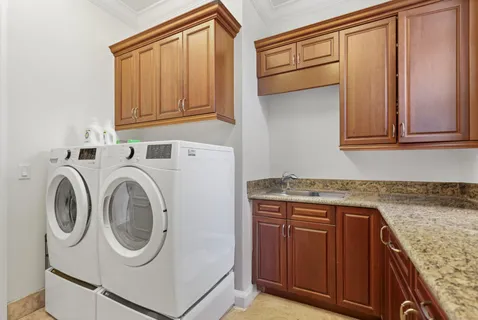 a view of a roof deck with wooden fence and floor