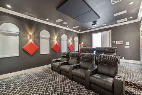 a view of a house with swimming pool and sitting area