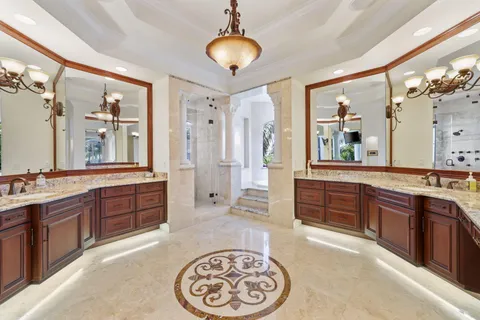 a view of house with swimming pool outdoor seating