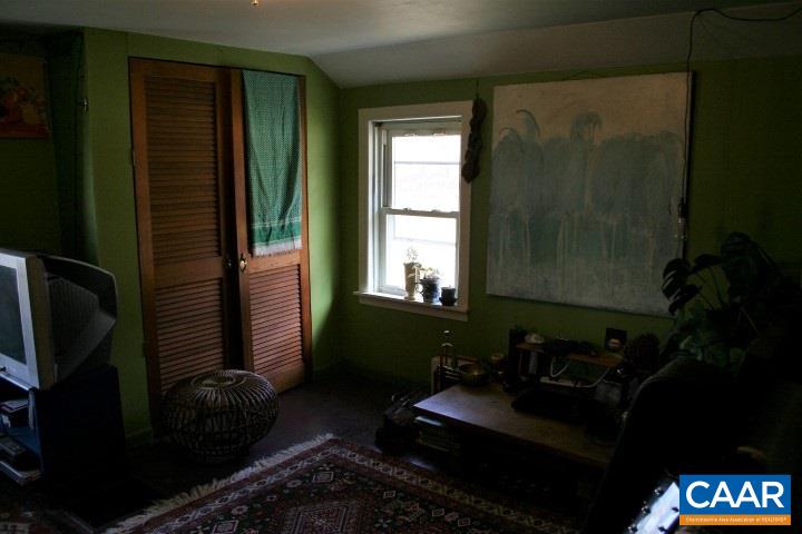 11582 Obannons Mill Road Boston, VA 22713 - Photo 23 of 36 a room with furniture and a window