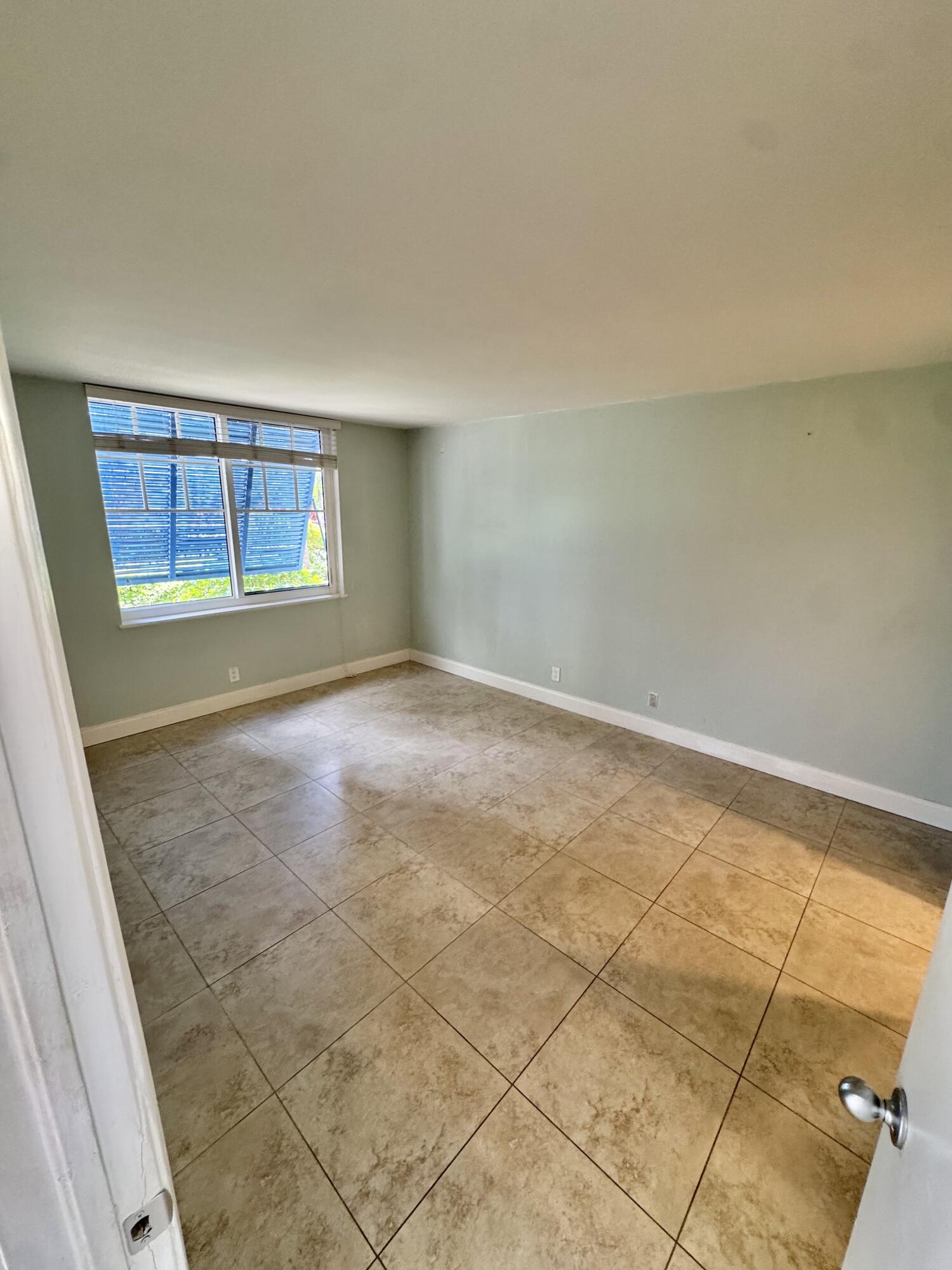 651 East Woolbright Road, Unit 103 Boynton Beach, FL 33435 - Photo 7 of 26 IMG_4716