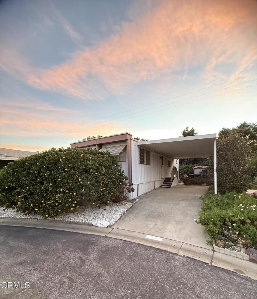 11100 Telegraph Road, Unit 57 Ventura, CA 93004 - Photo 1 of 1 a view of a house with a patio