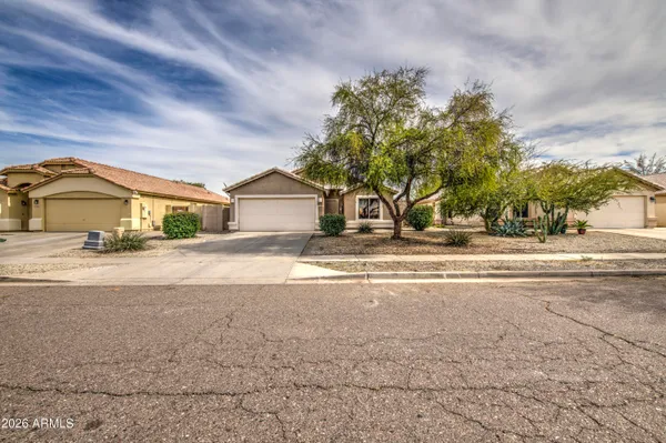 a house view with a garden space