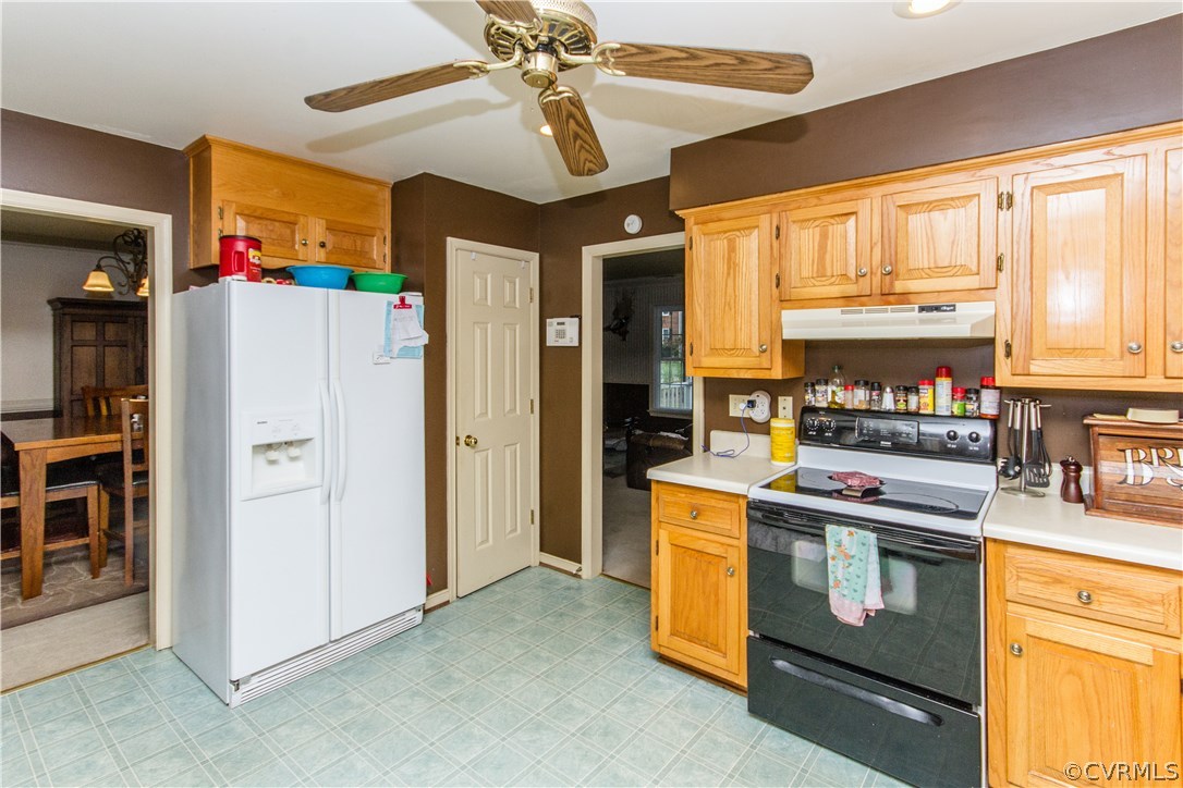 4004 Paces Ferry Road Chester, VA 23831 - Photo 8 of 50 a kitchen with a stove refrigerator and cabinets