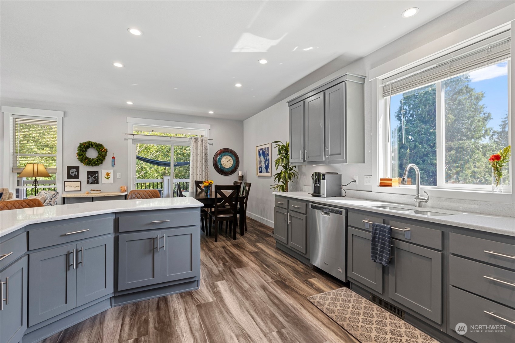 6303 Kirkhill Road Clinton, WA 98236 - Photo 16 of 40 a open kitchen with a sink and cabinets
