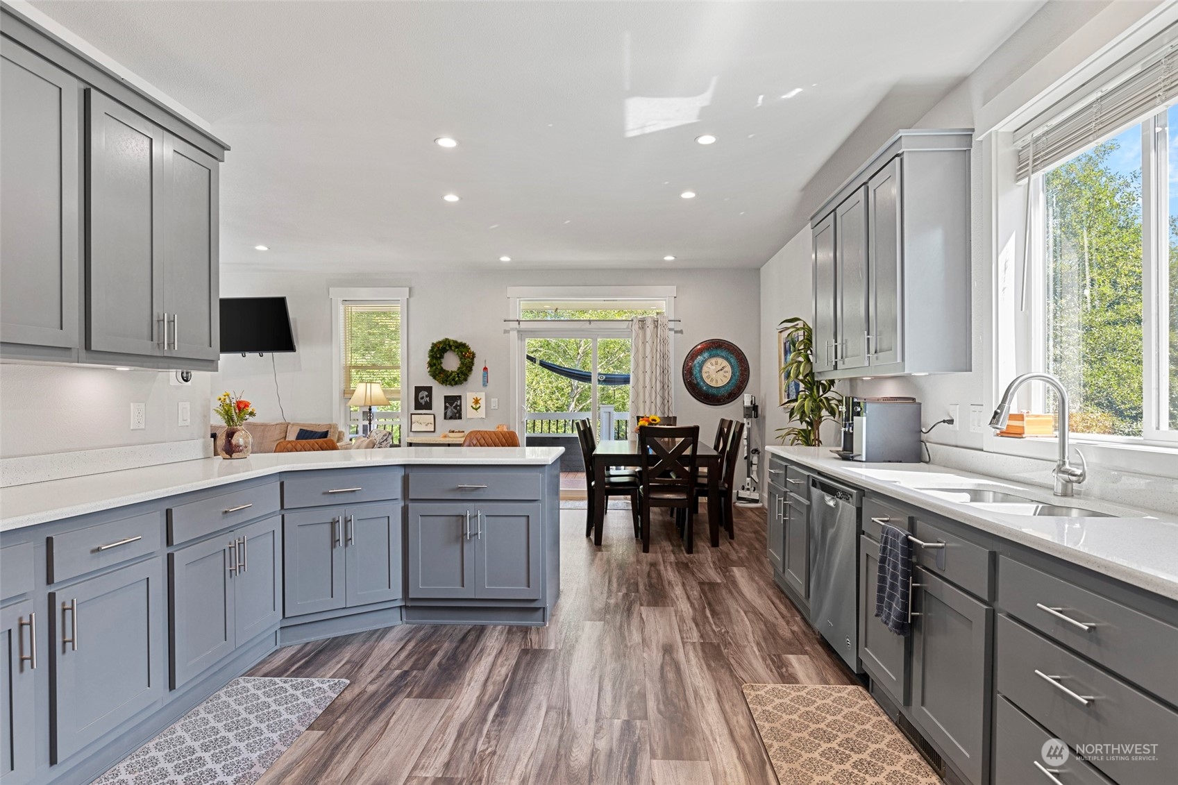 6303 Kirkhill Road Clinton, WA 98236 - Photo 17 of 40 a kitchen with sink cabinets and outdoor view
