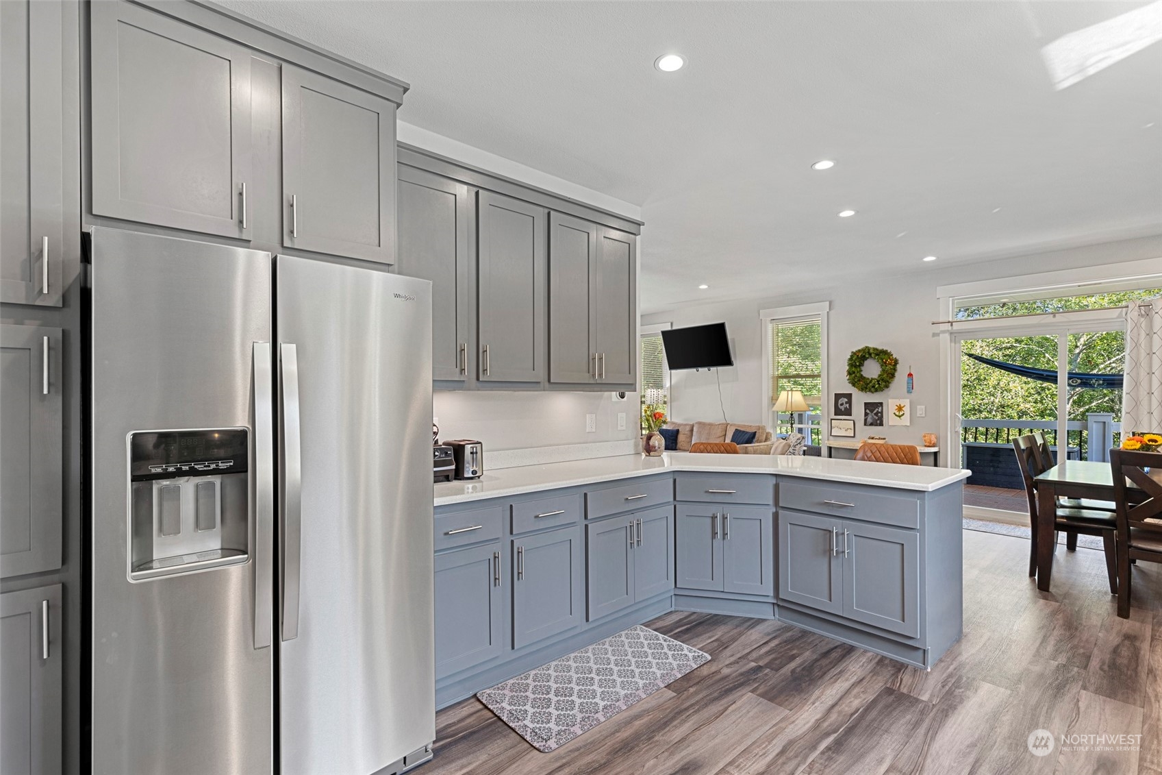 6303 Kirkhill Road Clinton, WA 98236 - Photo 19 of 40 a kitchen with a sink stainless steel appliances and cabinets
