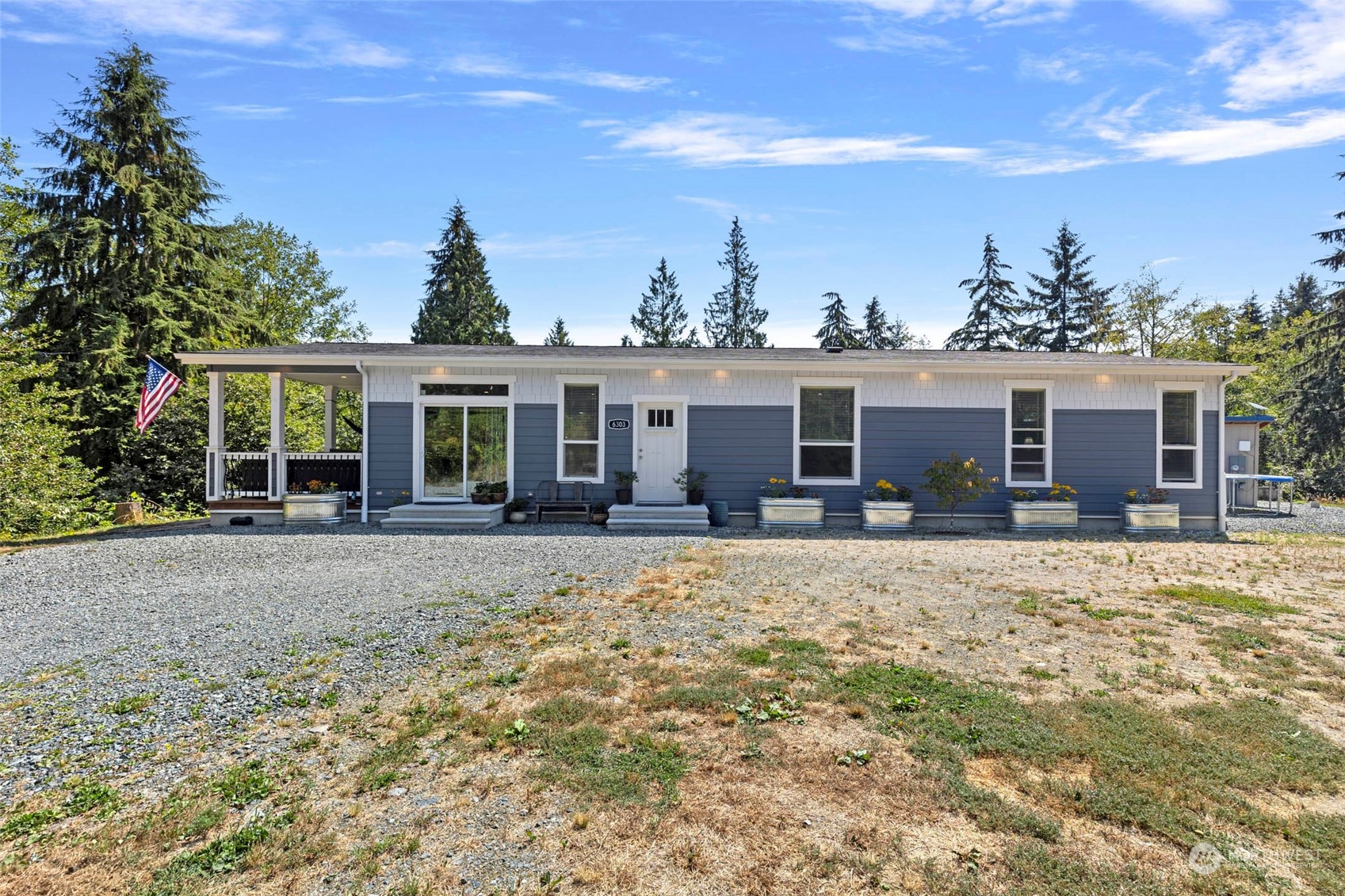 6303 Kirkhill Road Clinton, WA 98236 - Photo 2 of 40 front view of a house with a patio
