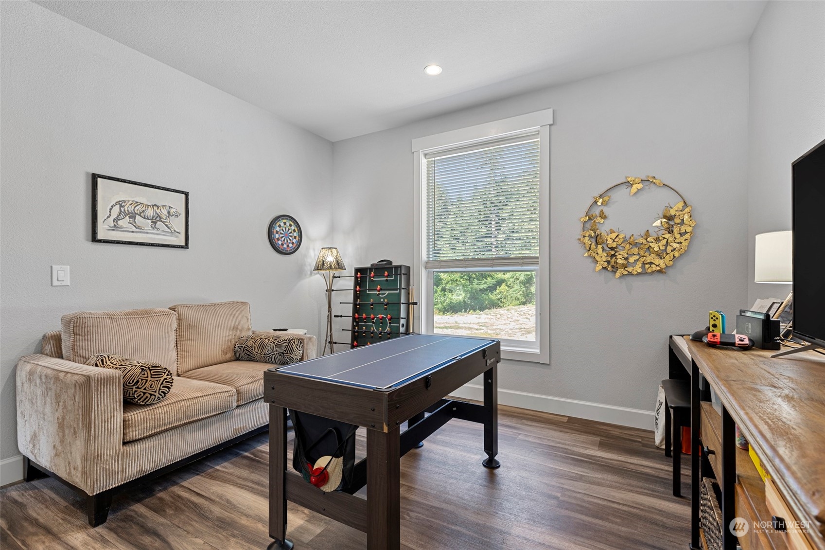 6303 Kirkhill Road Clinton, WA 98236 - Photo 23 of 40 a living room with furniture and a window