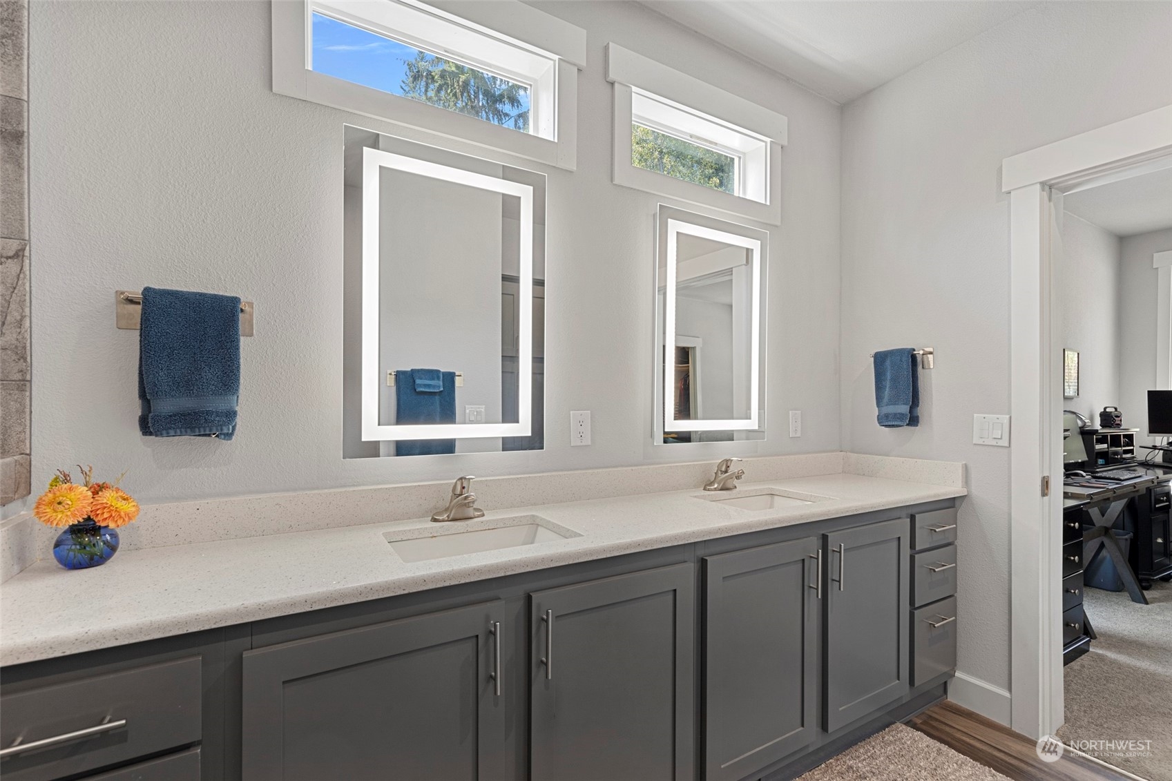 6303 Kirkhill Road Clinton, WA 98236 - Photo 27 of 40 a bathroom with a sink double vanity and a mirror