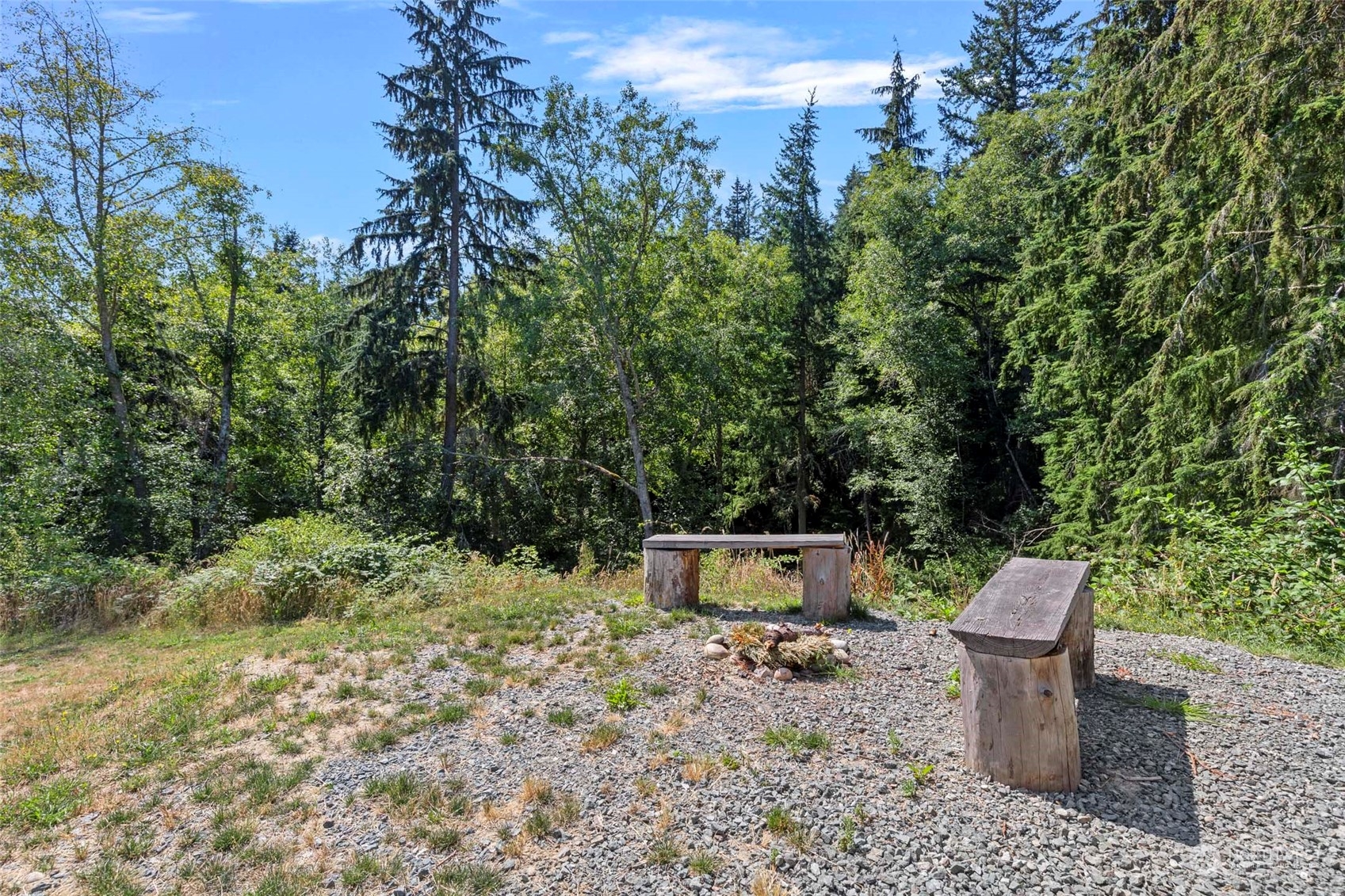 6303 Kirkhill Road Clinton, WA 98236 - Photo 35 of 40 a view of a garden with a house and a forest