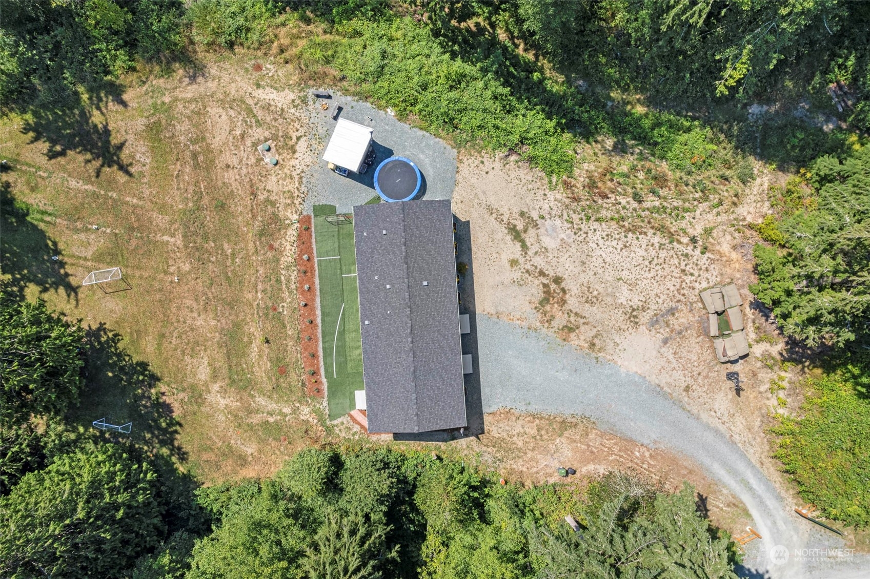6303 Kirkhill Road Clinton, WA 98236 - Photo 38 of 40 an aerial view of residential house with stairs and trees around