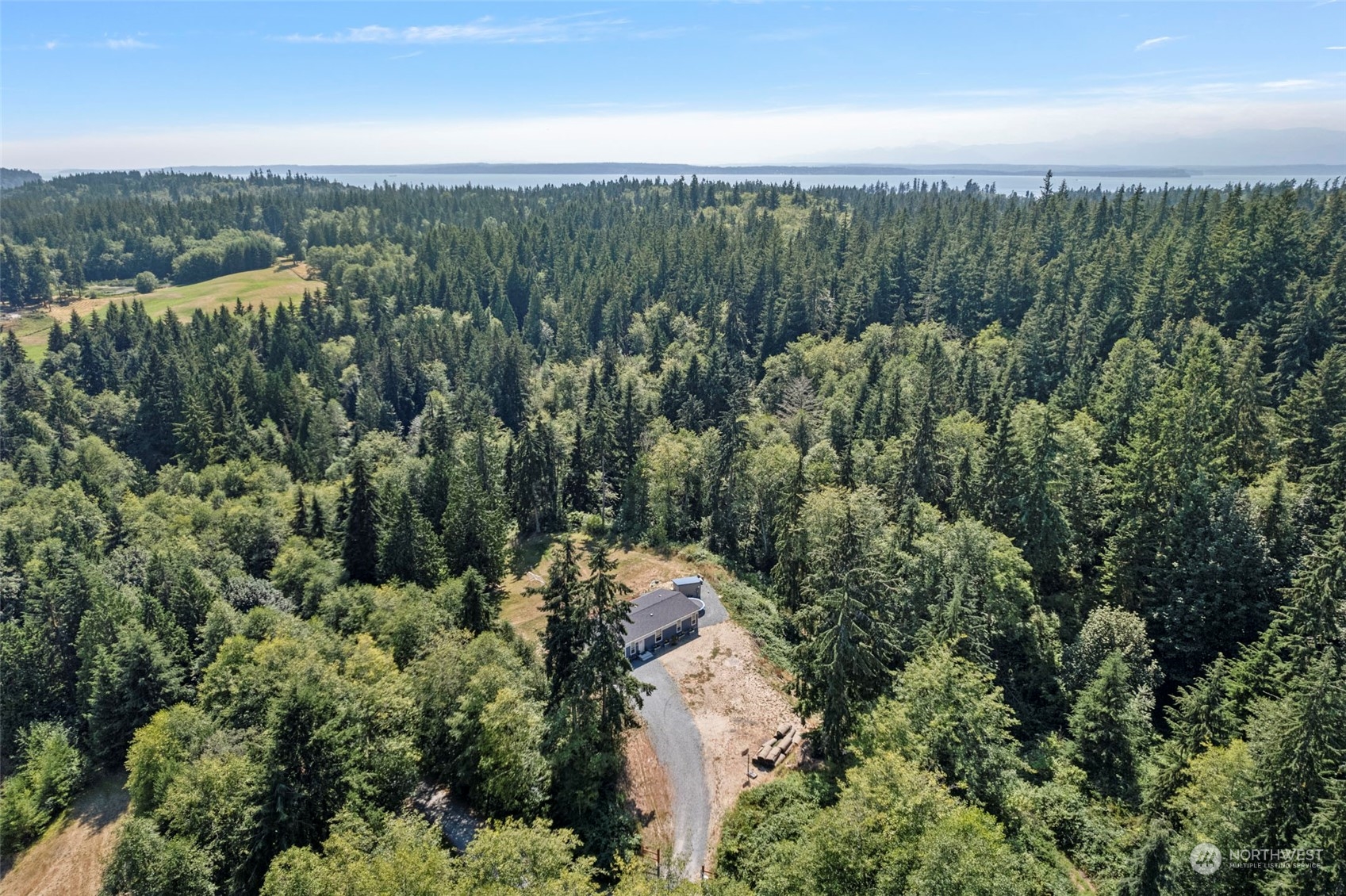 6303 Kirkhill Road Clinton, WA 98236 - Photo 39 of 40 an aerial view of a city with lots of residential buildings