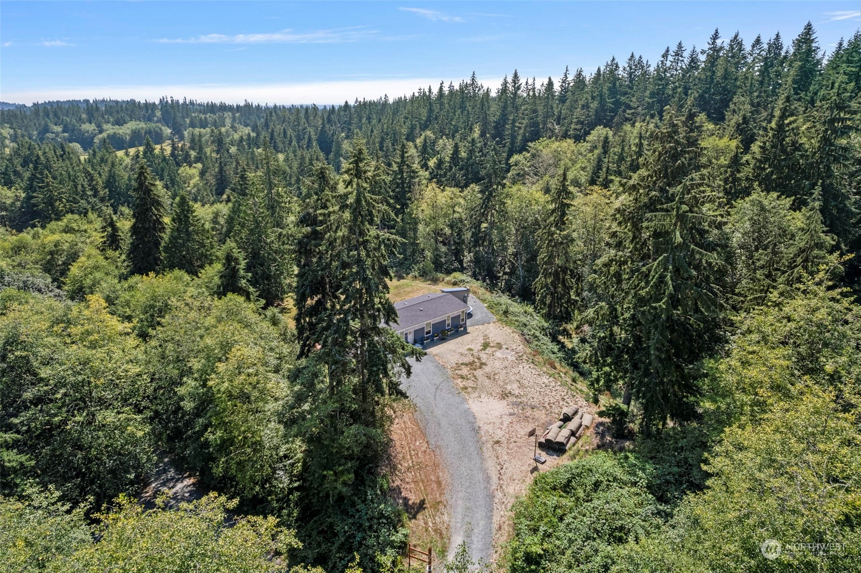6303 Kirkhill Road Clinton, WA 98236 - Photo 4 of 40 an aerial view of a house with mountain view