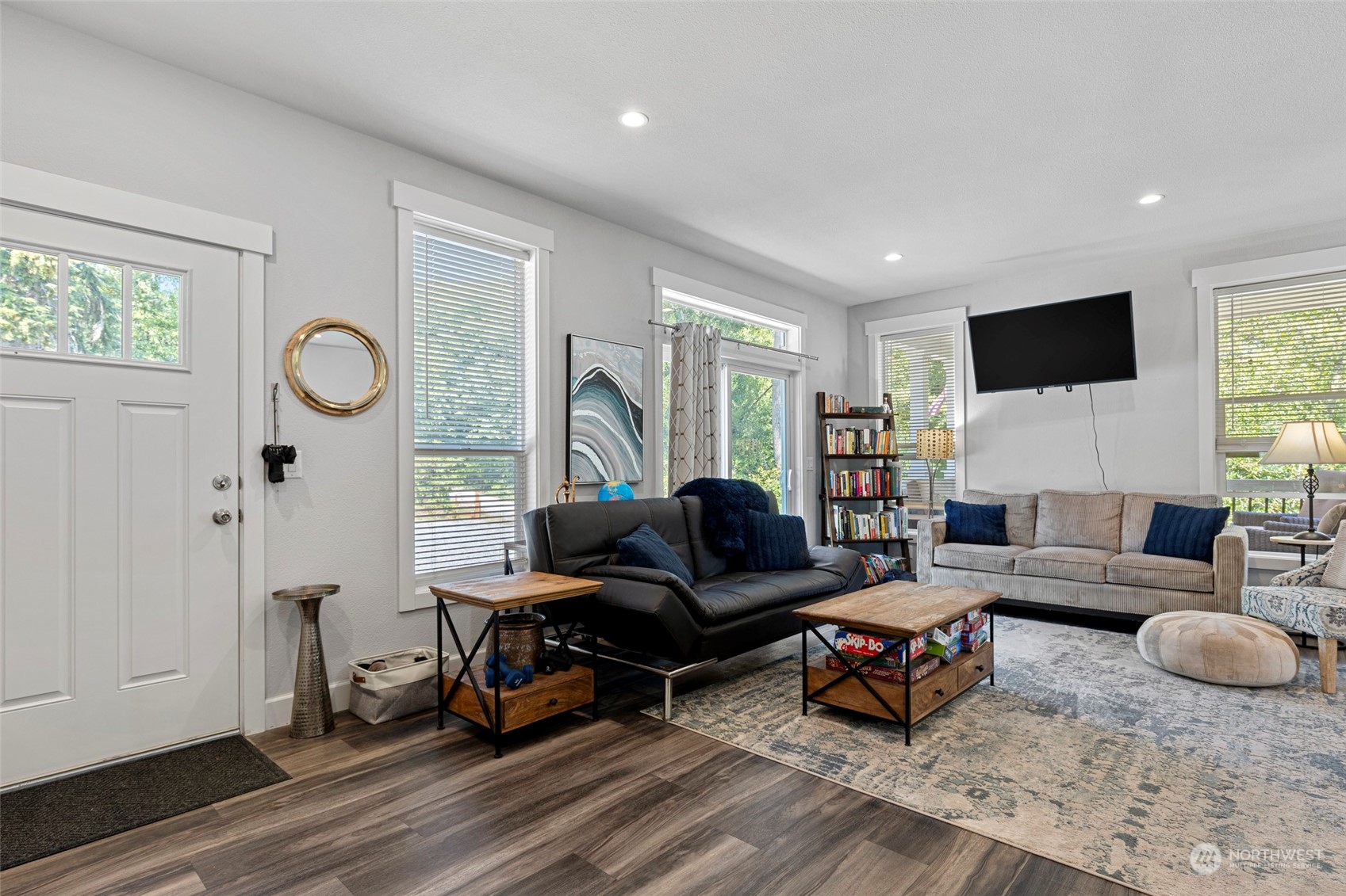 6303 Kirkhill Road Clinton, WA 98236 - Photo 8 of 40 a living room with furniture and a flat screen tv
