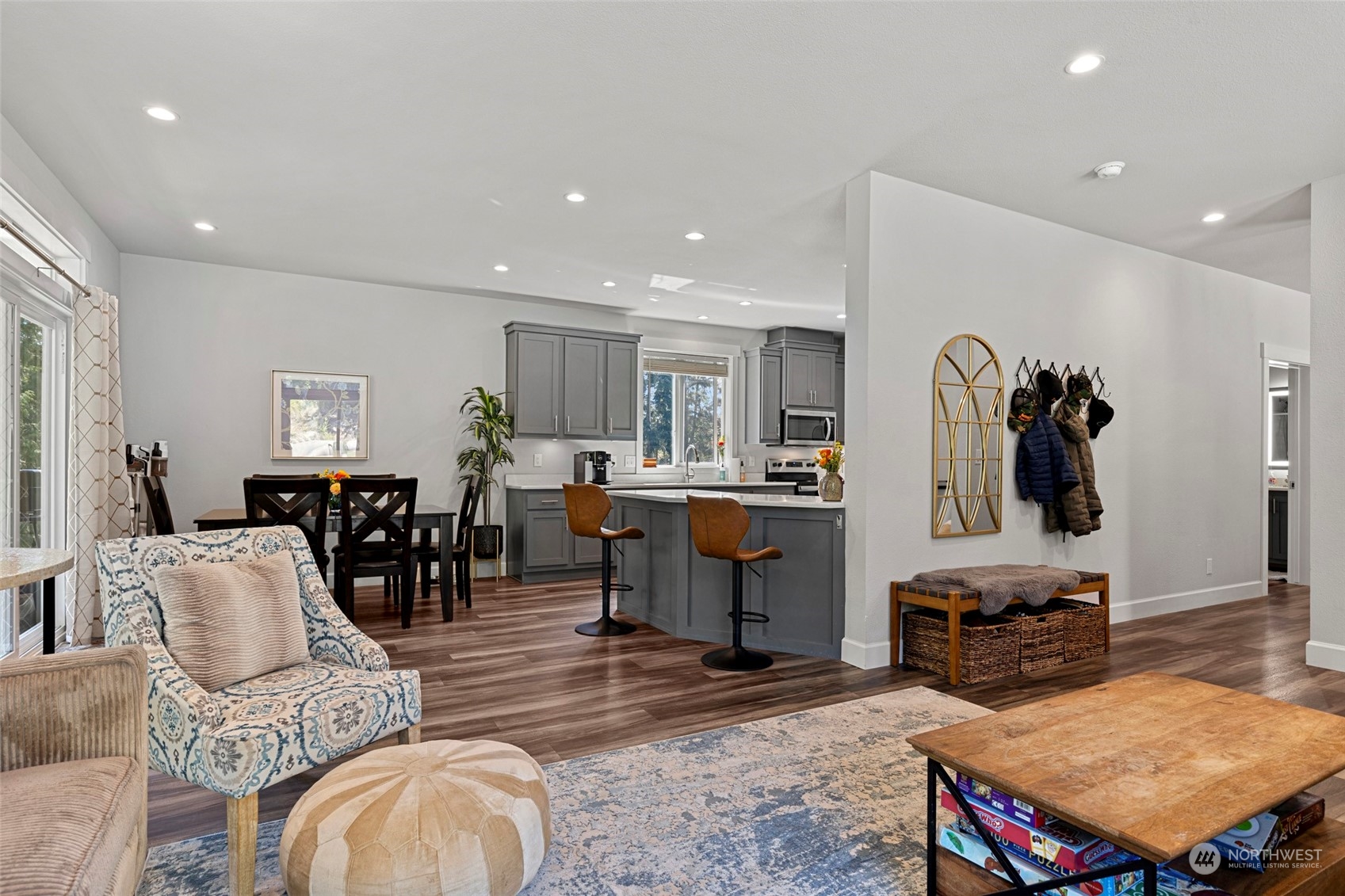 6303 Kirkhill Road Clinton, WA 98236 - Photo 9 of 40 a living room with furniture and kitchen view