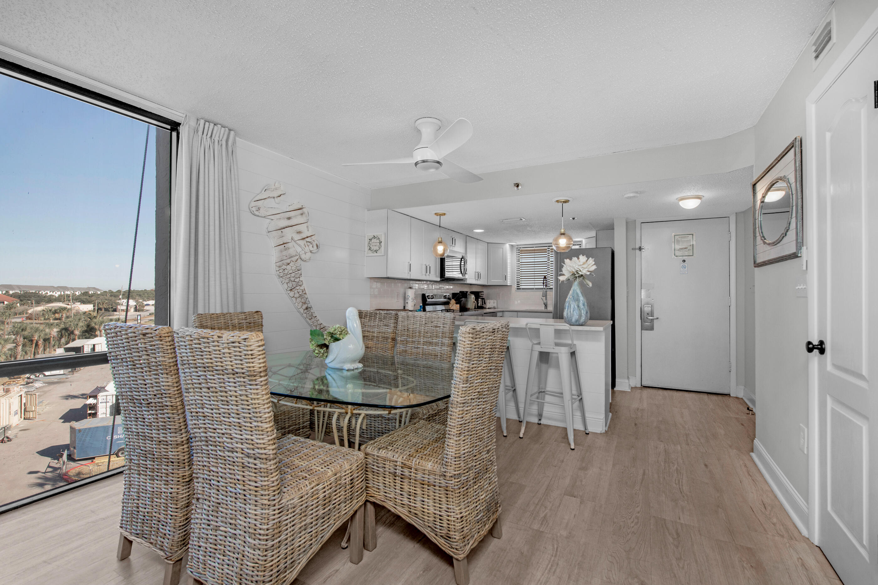 1040 Highway 98, Unit 518 Destin, FL 32541 - Photo 12 of 40 a living room with furniture and a table