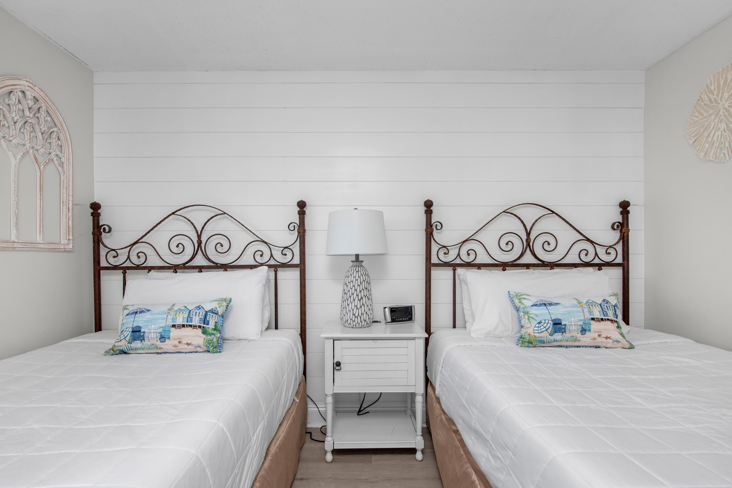 1040 Highway 98, Unit 518 Destin, FL 32541 - Photo 29 of 40 a bedroom with a bed and a table