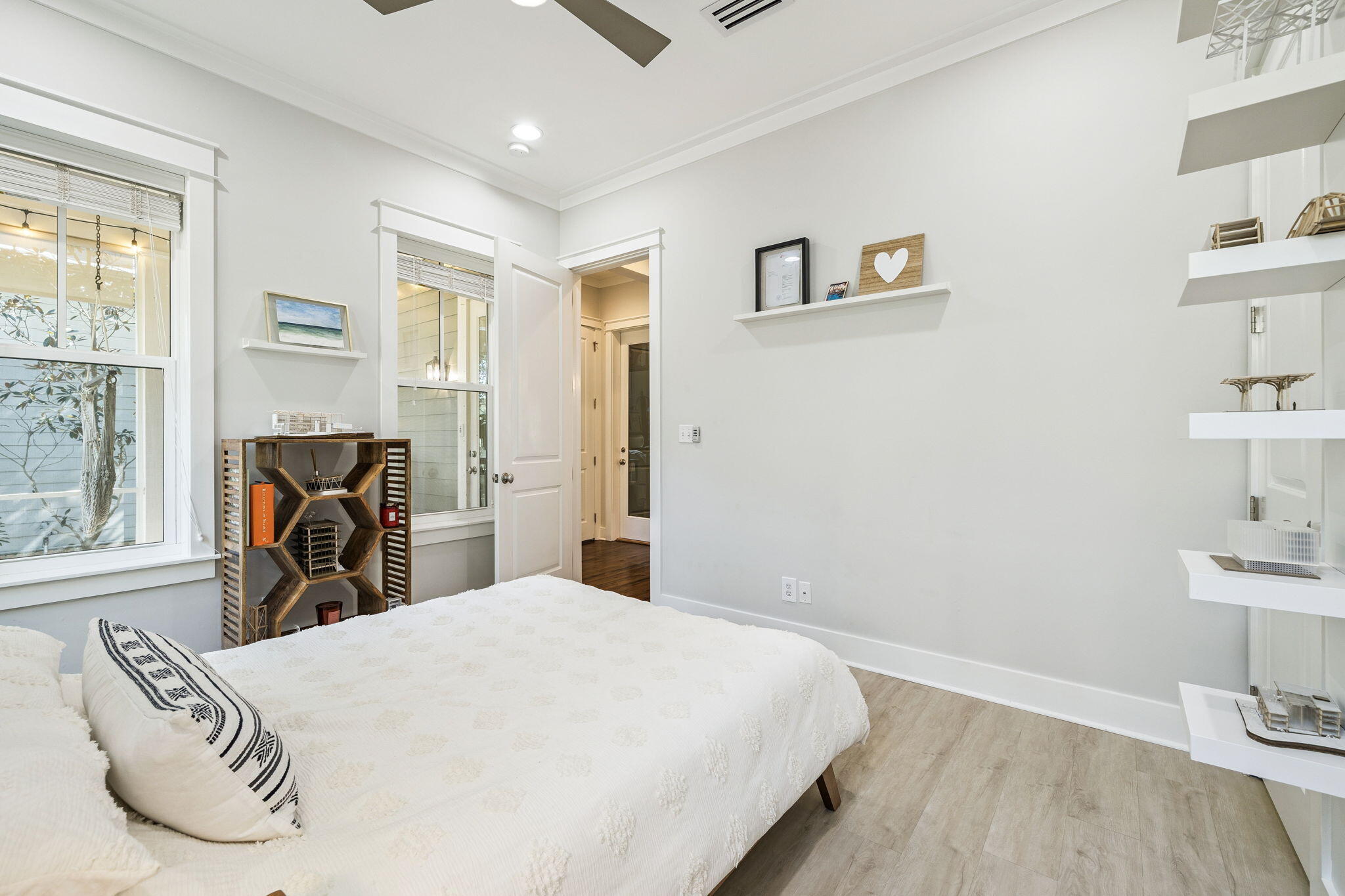 113 Nickajack North Santa Rosa Beach, FL 32459 - Photo 25 of 87 a bedroom with a bed and wooden floor