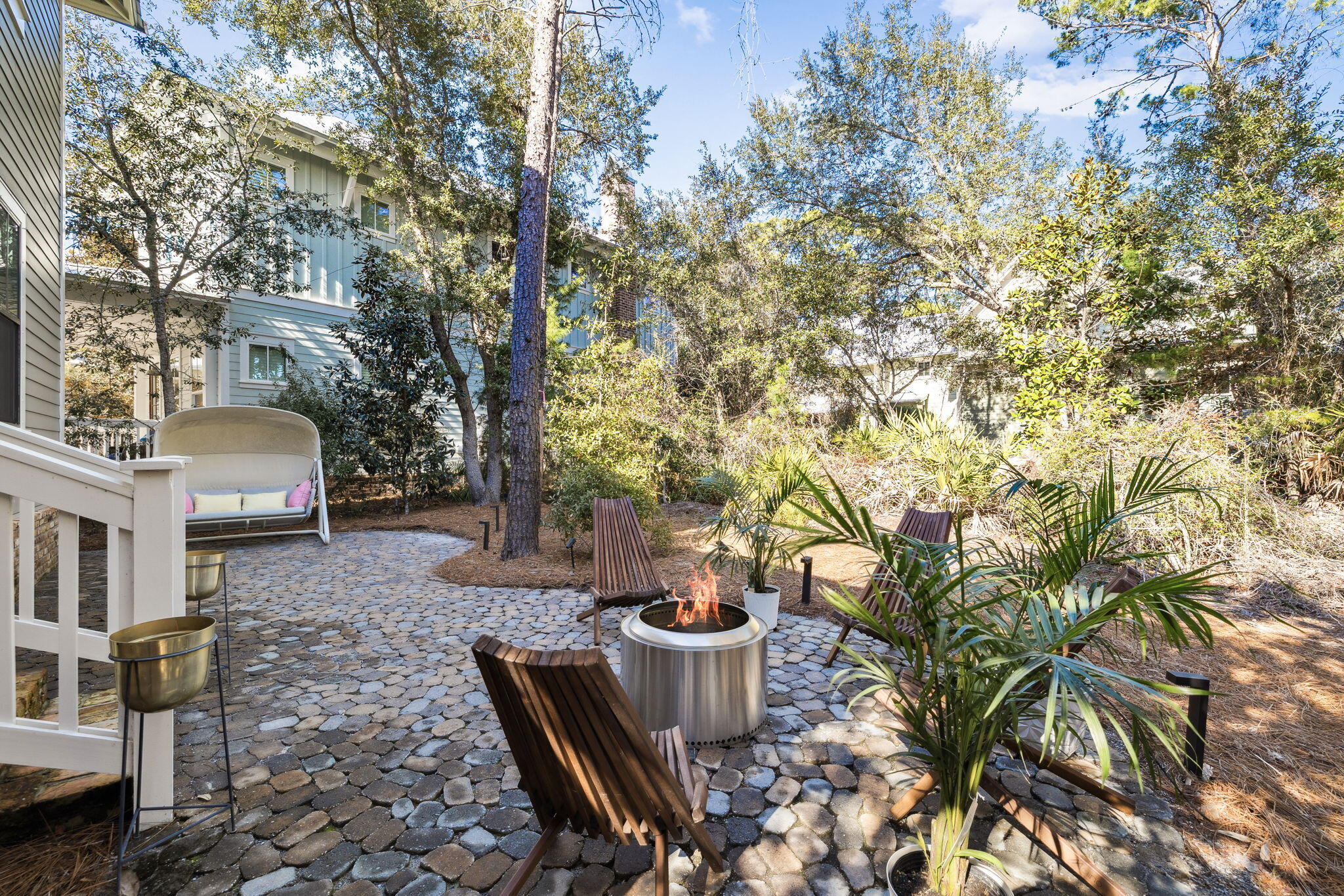 113 Nickajack North Santa Rosa Beach, FL 32459 - Photo 57 of 87 a backyard of a house with table and chairs