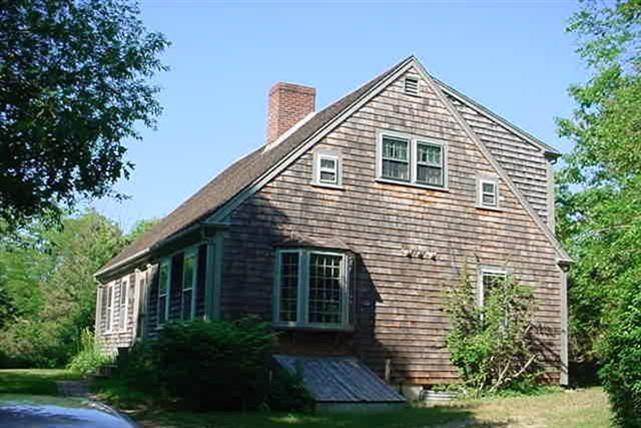 31 Truro Center Road Truro, MA 02666 - Photo 1 of 15 a front view of a house with garden