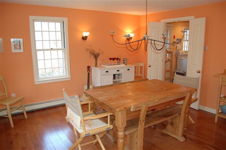 31 Truro Center Road Truro, MA 02666 - Photo 6 of 15 a dining room with a table chairs and wooden floor