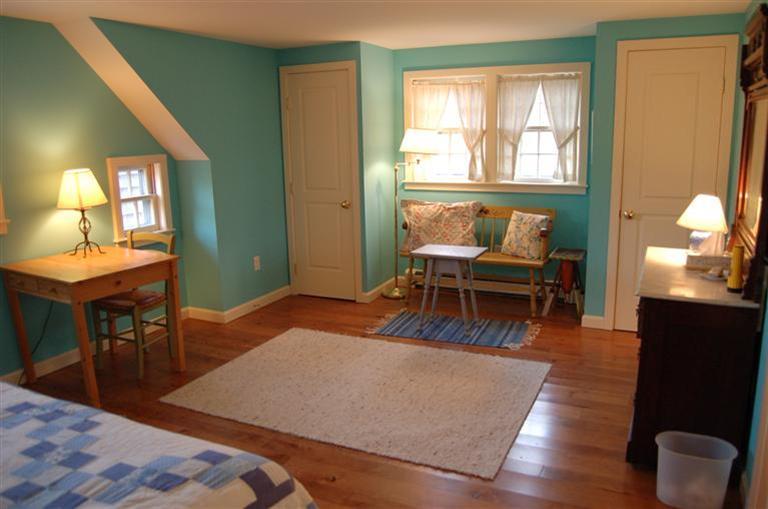 31 Truro Center Road Truro, MA 02666 - Photo 10 of 15 a living room with furniture and a wooden floor