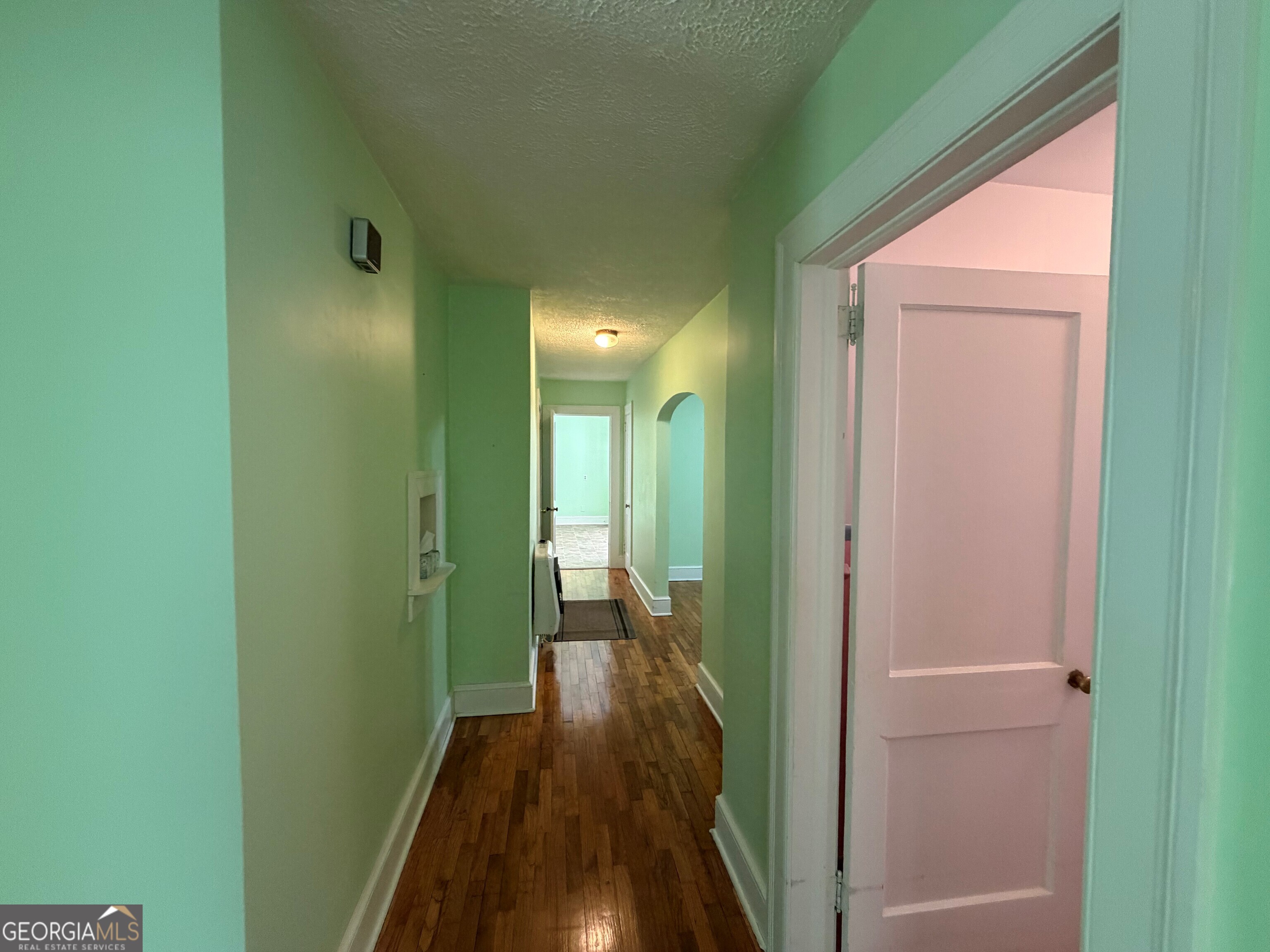 2619 Maple Road Southeast Rome, GA 30161 - Photo 29 of 31 a view of a hallway with wooden floor