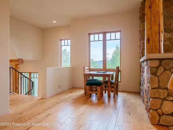a view of backyard with hardwood and deck
