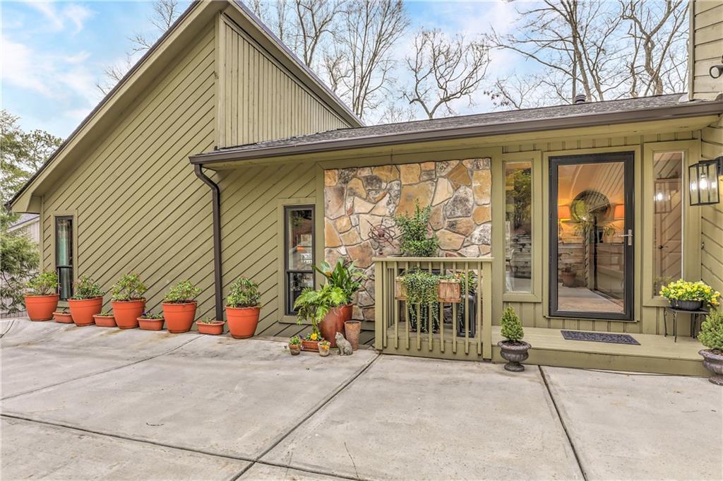 4301 Highland View Roswell, GA 30075 - Photo 1 of 1 a backyard of a house with outdoor seating