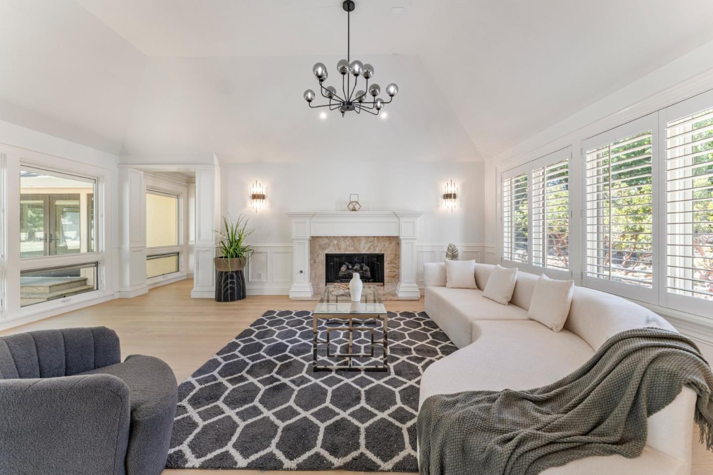 1080 Finley Road Pleasanton, CA 94588 - Photo 9 of 85 a bedroom with a large bed and a couch
