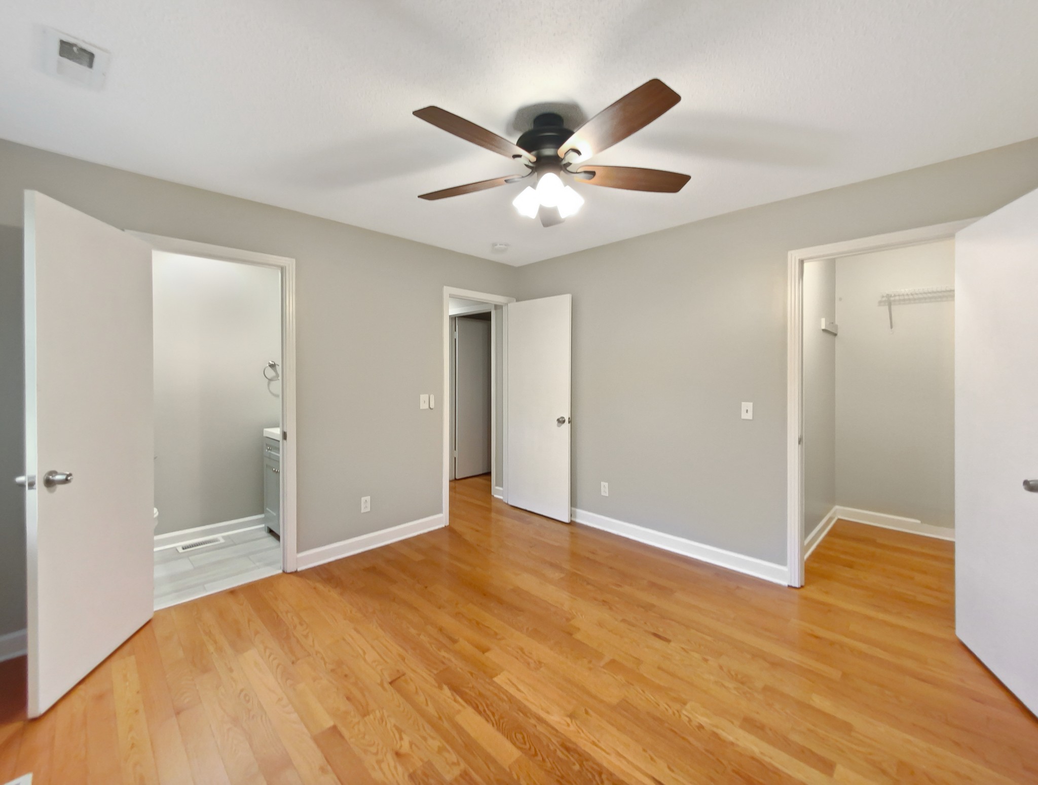 1223 Main Street Pleasant View, TN 37146 - Photo 15 of 20 a view of a big room with wooden floor and windows in a room
