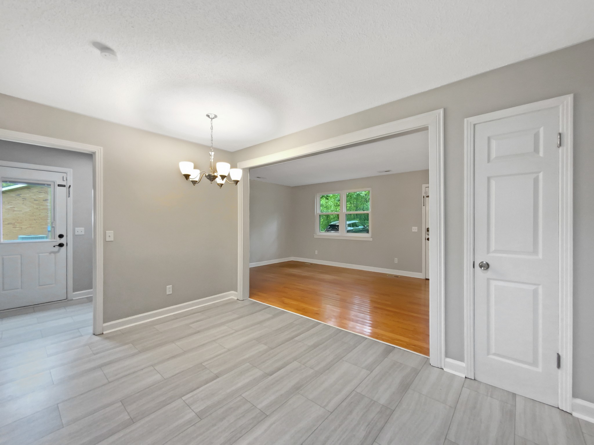1223 Main Street Pleasant View, TN 37146 - Photo 16 of 20 wooden floor in an empty room with a window