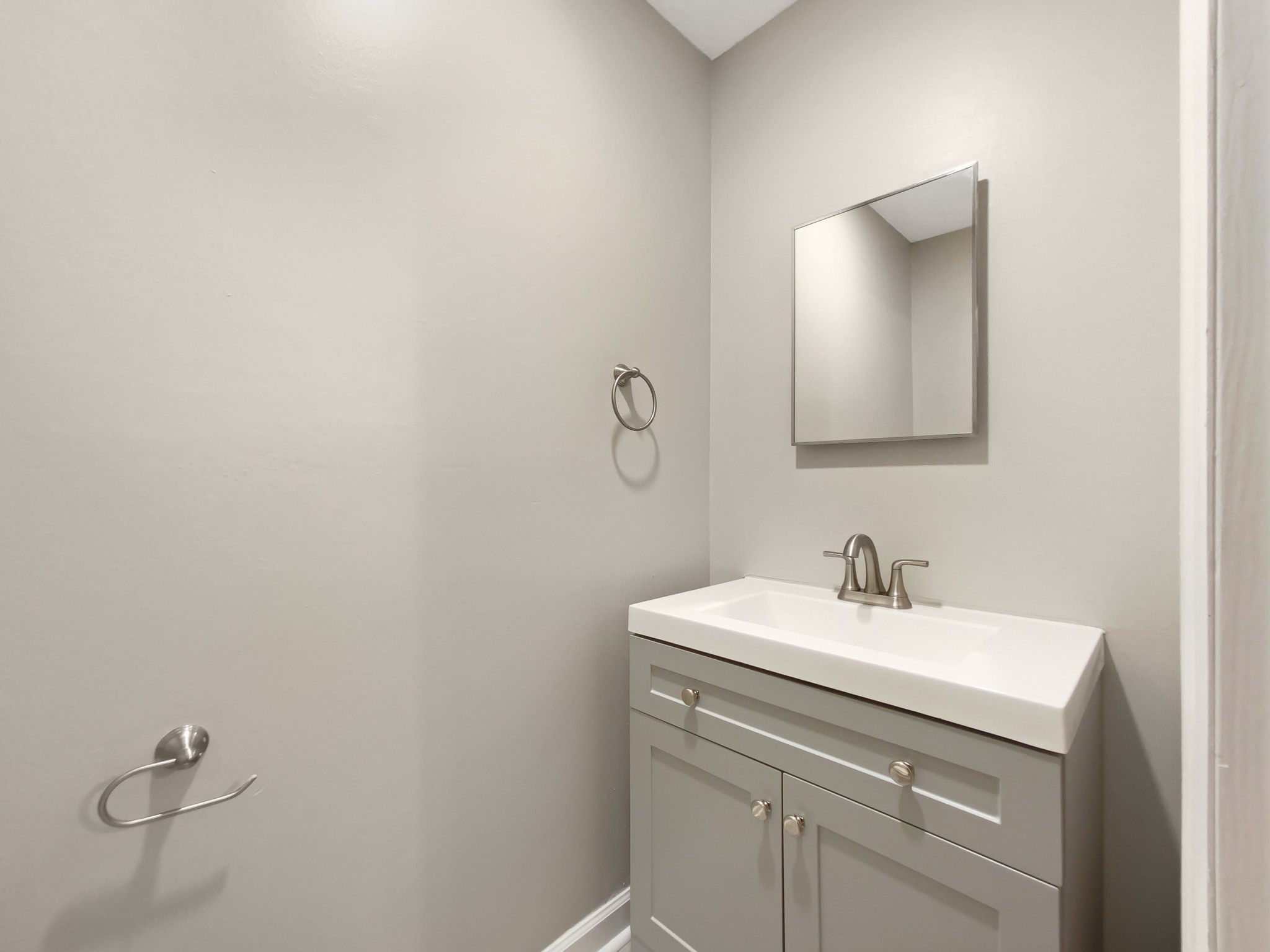 1223 Main Street Pleasant View, TN 37146 - Photo 17 of 20 a bathroom with a sink and mirror