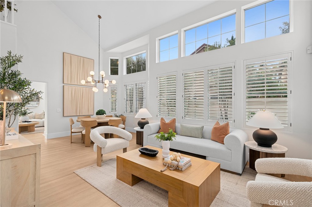 20 Fecamp Newport Coast, CA 92657 - Photo 1 of 35 a living room with furniture potted plant and a large window