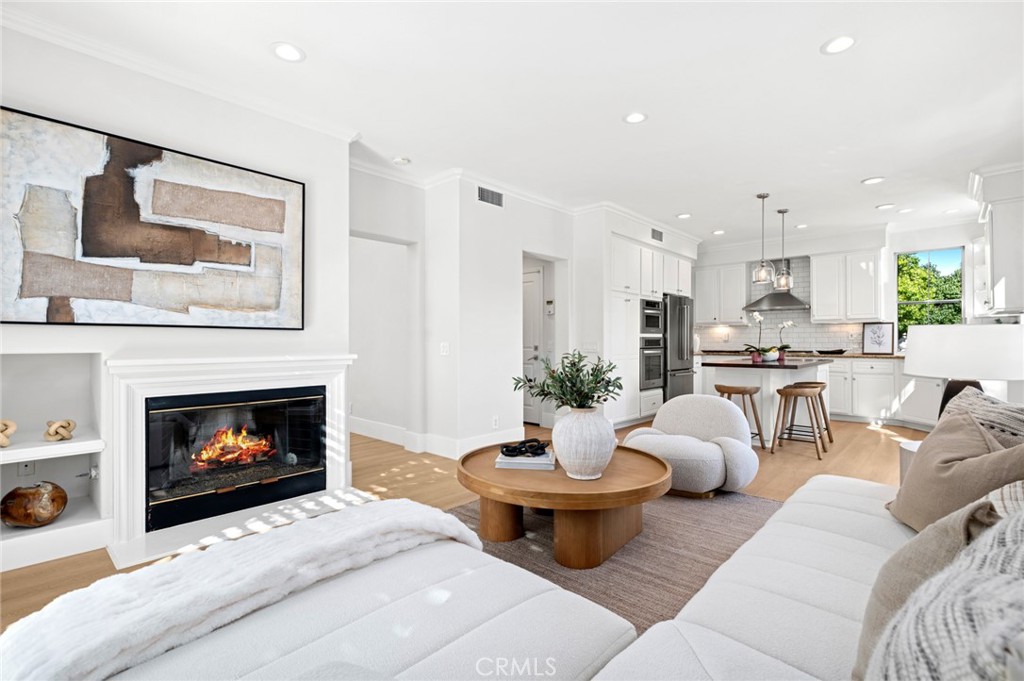 20 Fecamp Newport Coast, CA 92657 - Photo 8 of 35 a living room with furniture and a fireplace