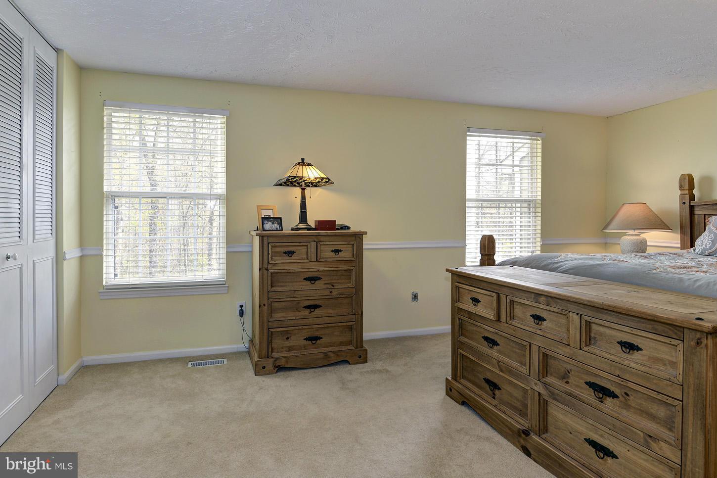 1511 Autumn Ridge Circle Reston, VA 20194 - Photo 14 of 29 a room with furniture and a window