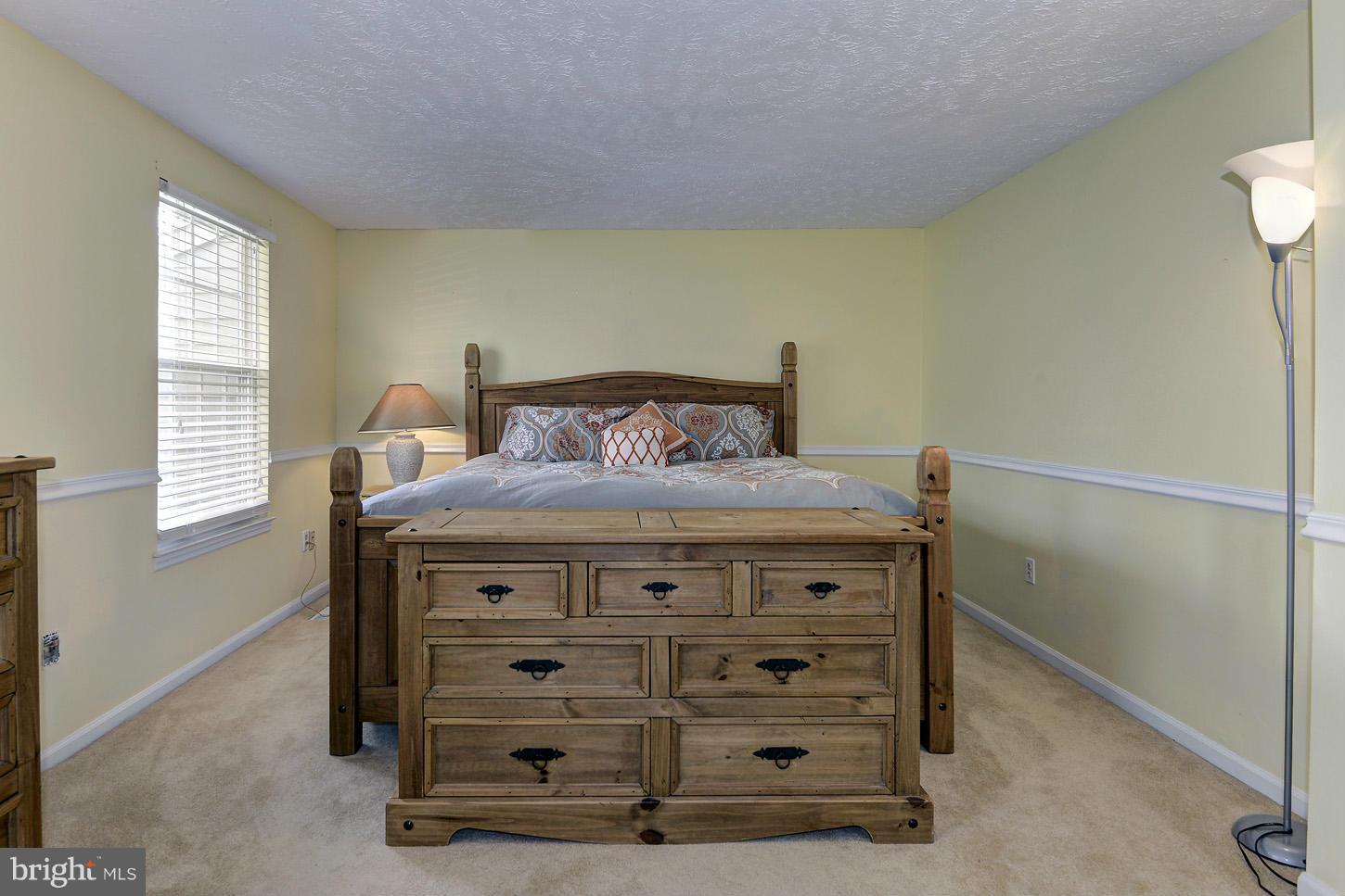 1511 Autumn Ridge Circle Reston, VA 20194 - Photo 15 of 29 a room with a bed and a window