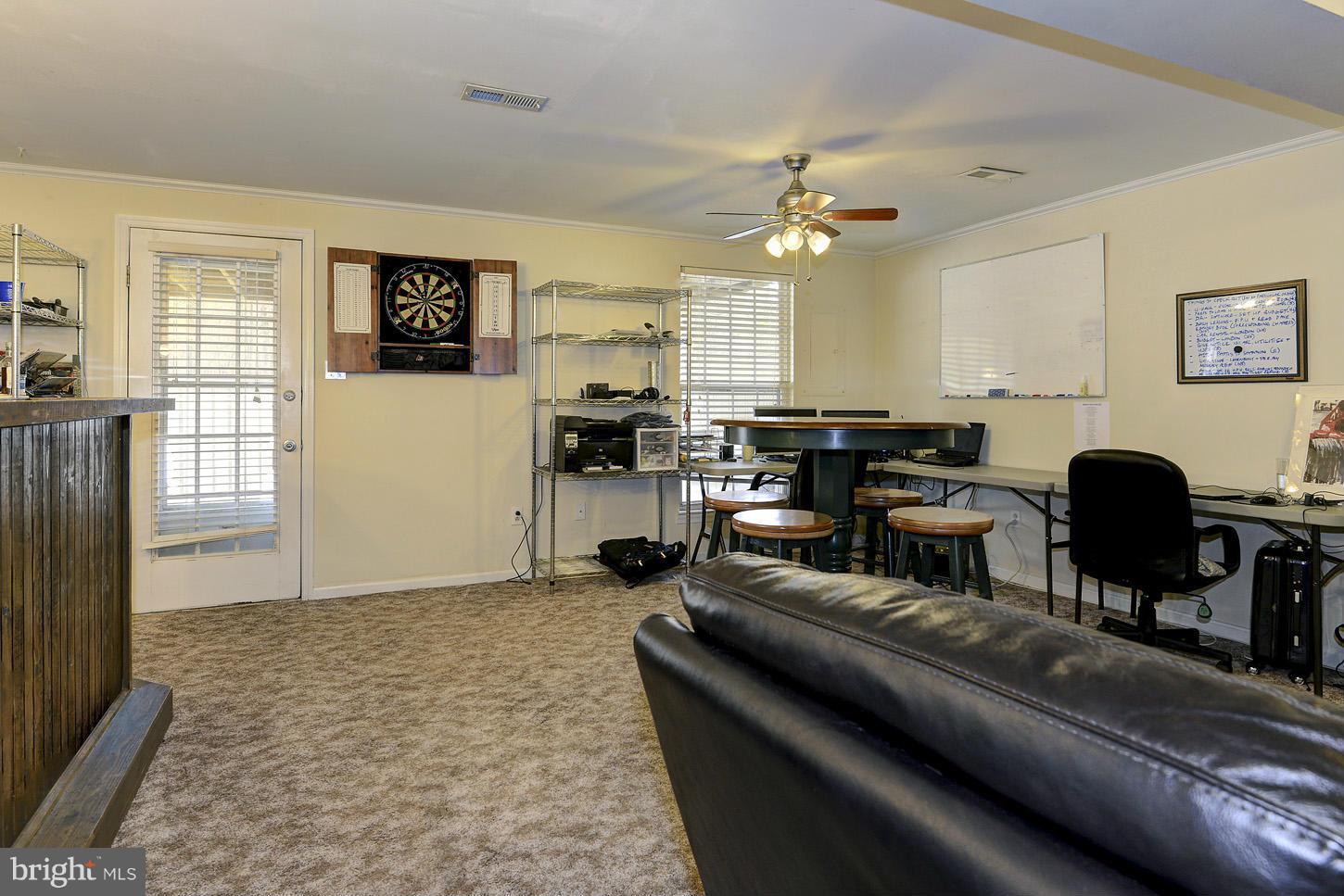 1511 Autumn Ridge Circle Reston, VA 20194 - Photo 17 of 29 a living room with furniture and a flat screen tv